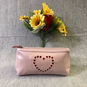 NWOT - Pink Pearlized Clutch with Heart Cutouts